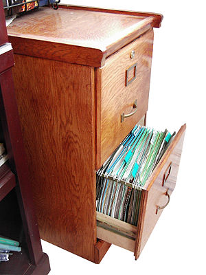 English: Wooden File Cabinet with drawer open....